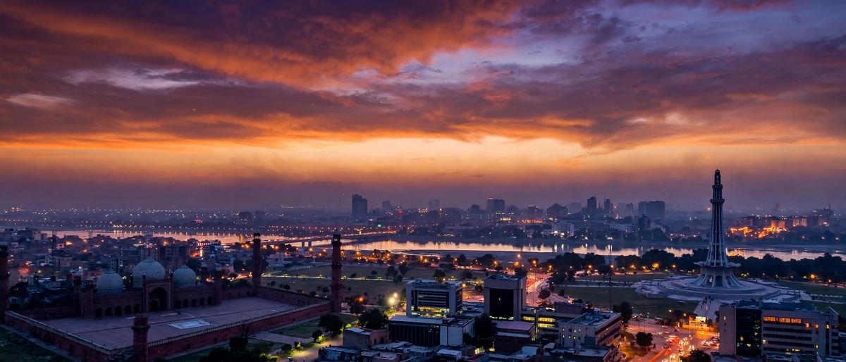 Lahore skyline at dusk — one of twelve Pakistani cities where we help businesses rank on Google